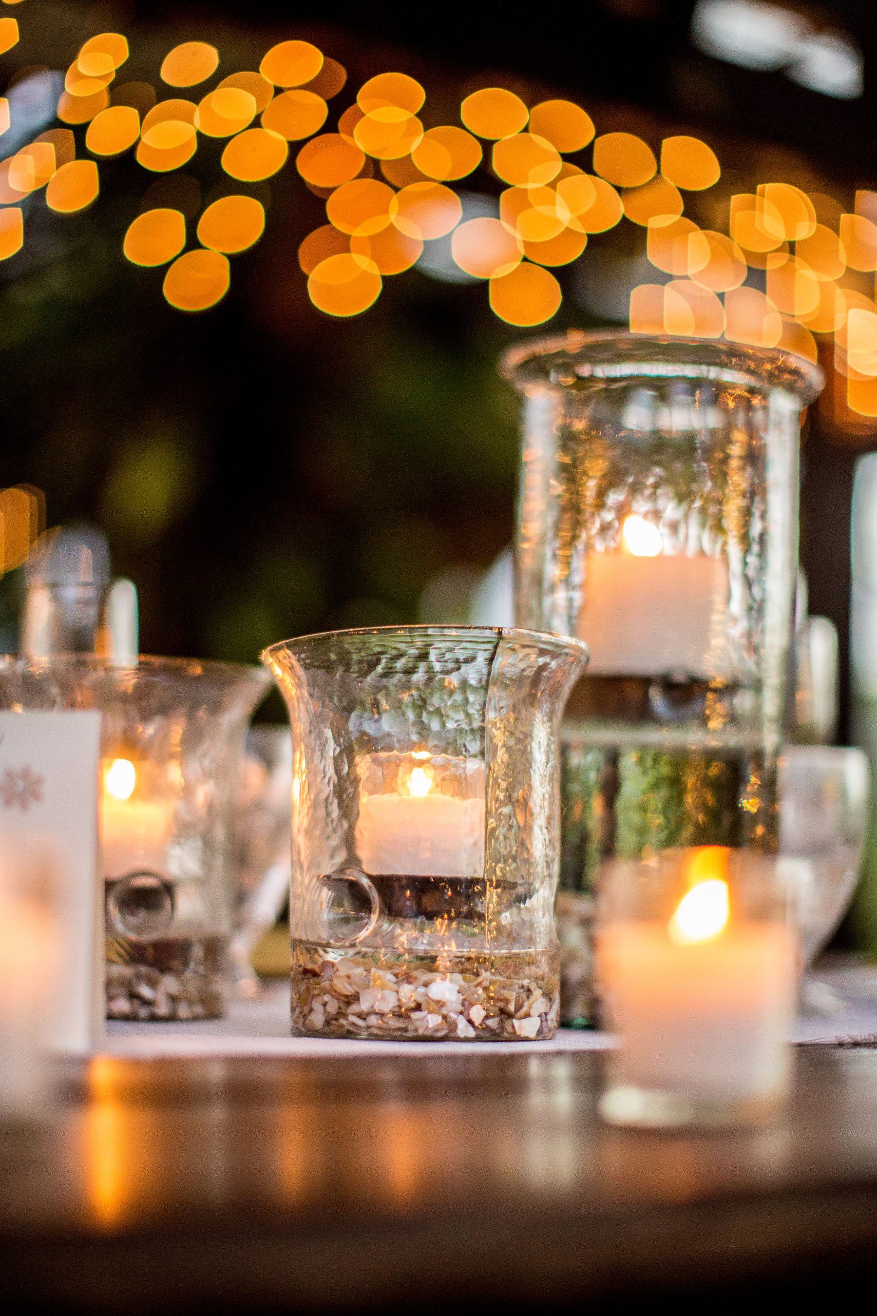 Candlelight on pew-oak tables