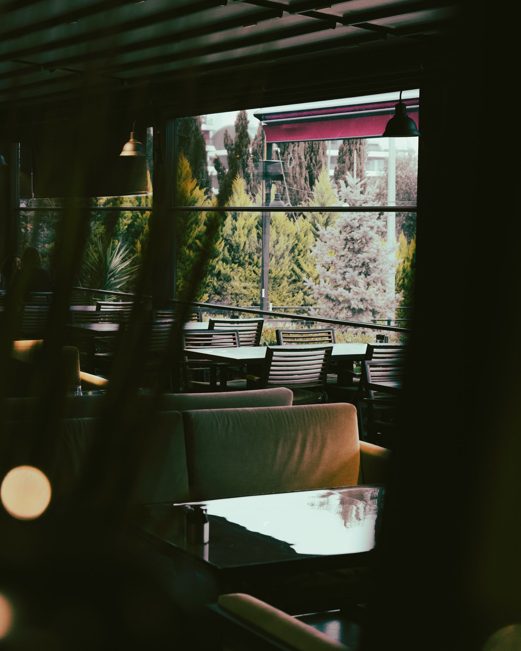 Tables along the stone wall of the dining room